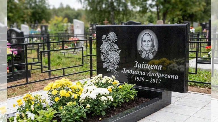 Памятник с гравировкой хризантем — выполненная работа «Зайцева» в Рязани