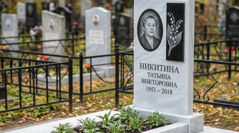 Памятник с гравировкой ландышей — выполненная работа «Никитина» в Рязани