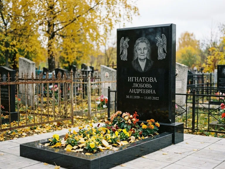 Памятник с гравировкой ангела — гравировка двух ангелов по сторонам портрета, работа «Игнатова» в Рязани