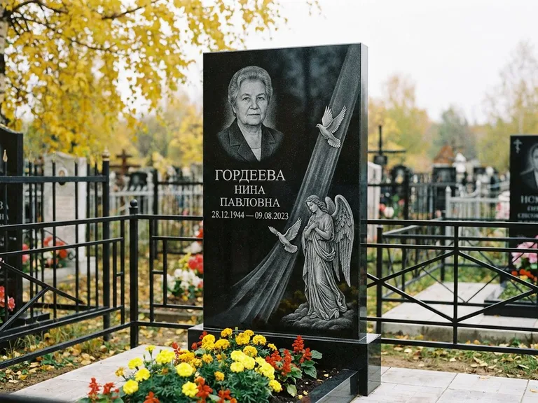 Памятник с гравировкой ангела — гравировка ангела с голубем по диагонали стелы, работа «Гордеева» в Рязани